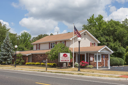 Moore Funeral Home's logo